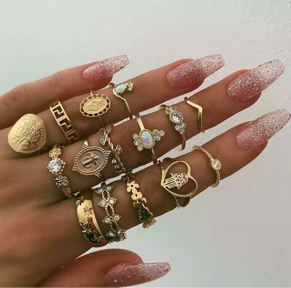 Gold Avatar Cross Ring Collection